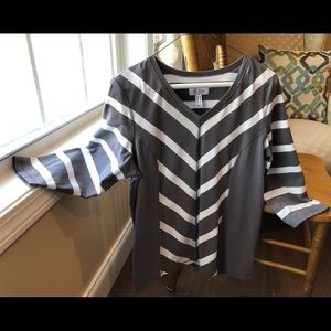 Free Women’s Denim & Co elbow Tee with purchase.